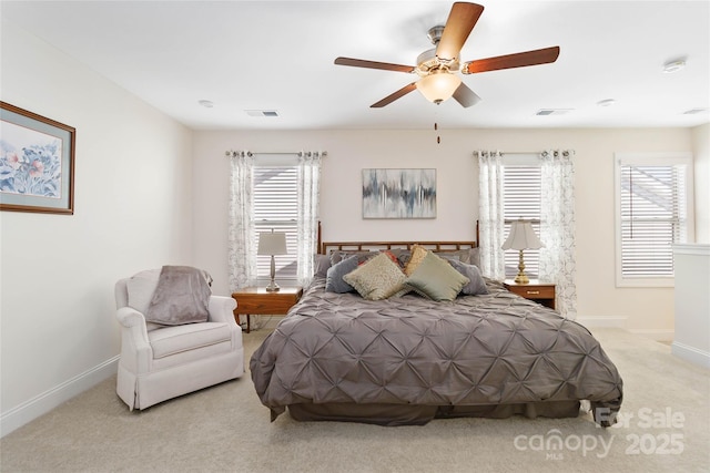 bedroom featuring visible vents, carpet, a ceiling fan, and baseboards