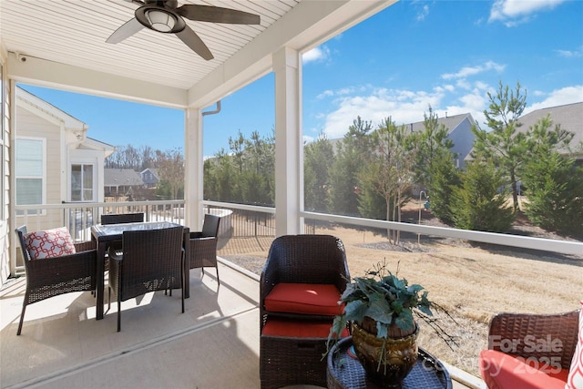 view of patio with ceiling fan and outdoor dining space