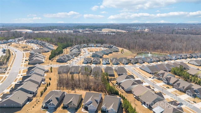 birds eye view of property with a residential view