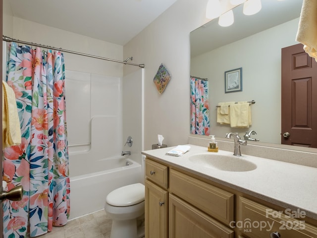 full bathroom with shower / tub combo, vanity, and toilet