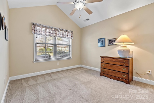 carpeted bedroom with lofted ceiling, visible vents, ceiling fan, and baseboards