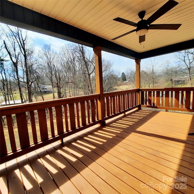 wooden terrace with ceiling fan