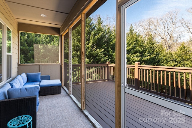 sunroom / solarium featuring plenty of natural light