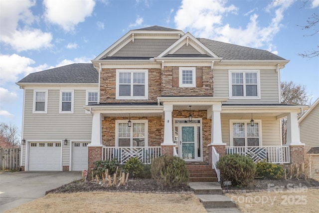 craftsman-style house featuring driveway, stone siding, a garage, and a porch