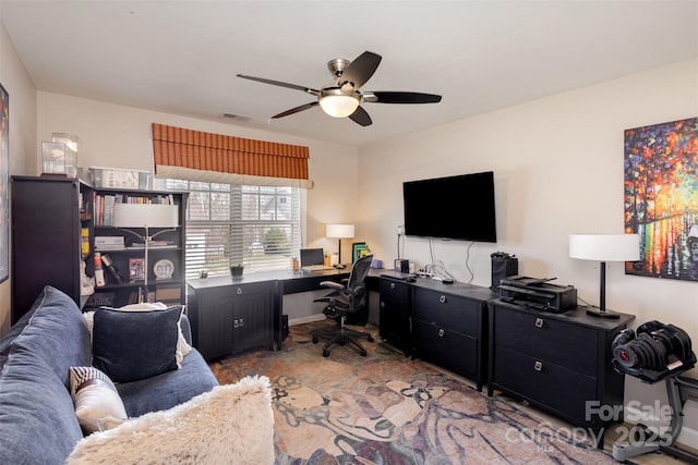 office space featuring visible vents and ceiling fan