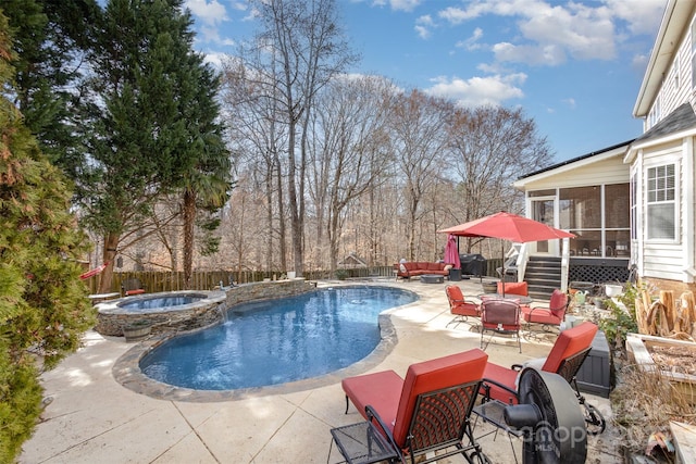 view of pool with a patio, a sunroom, a fenced backyard, a pool with connected hot tub, and an outdoor living space