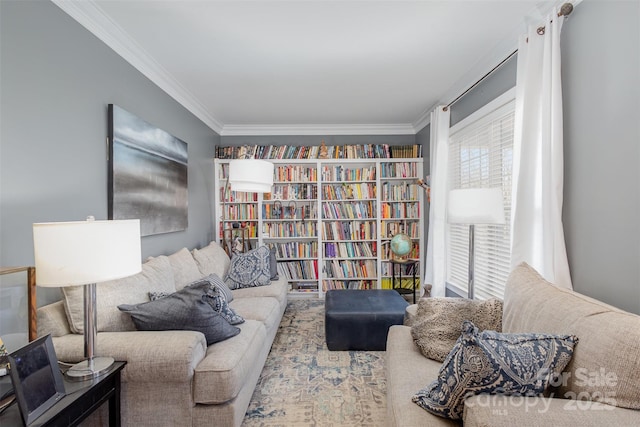 sitting room featuring crown molding