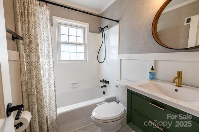 bathroom with shower / bath combo, vanity, and toilet