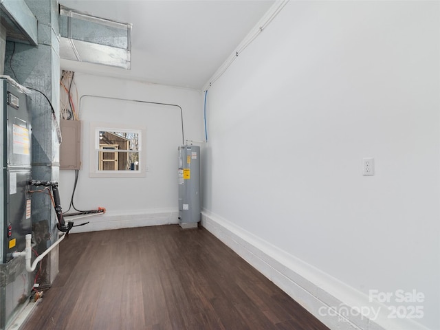 utility room featuring water heater