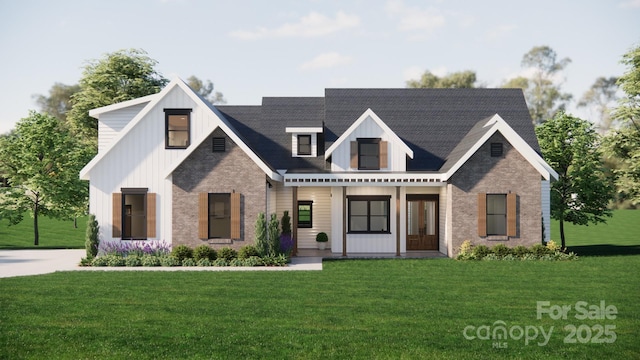 view of front of home with brick siding and a front yard