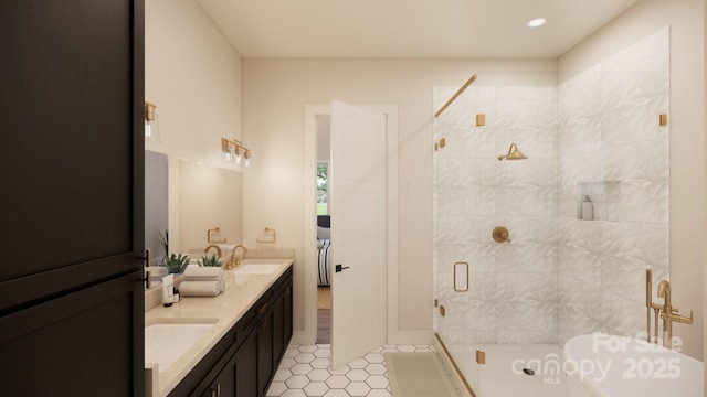 bathroom featuring a freestanding tub, recessed lighting, a sink, a shower stall, and double vanity