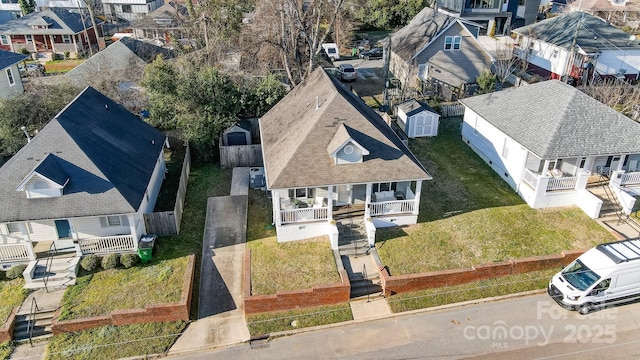 birds eye view of property featuring a residential view