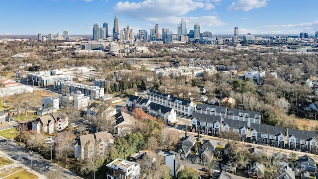 birds eye view of property with a view of city