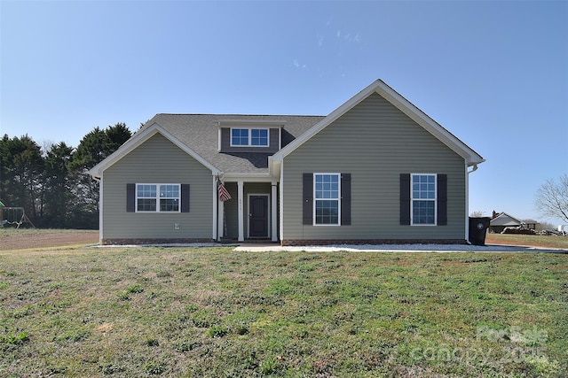 view of front of home with a front lawn