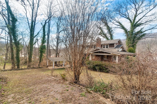 view of front of house with a chimney