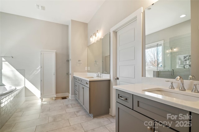 bathroom with two vanities, visible vents, a sink, and a shower stall