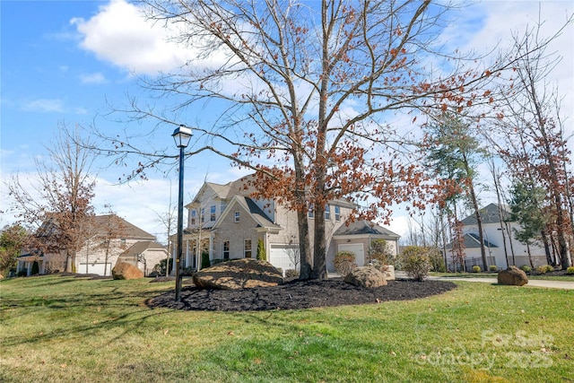 view of side of property featuring a lawn