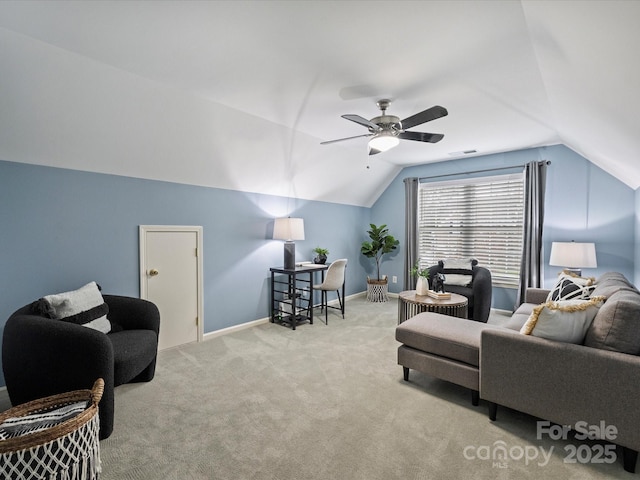 living area featuring visible vents, baseboards, lofted ceiling, and carpet flooring