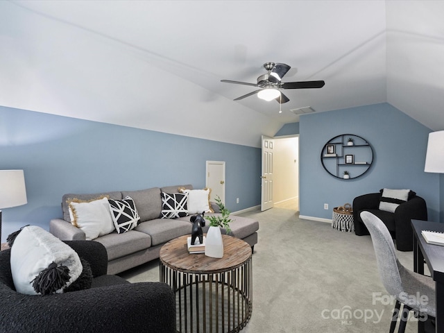 living room featuring visible vents, light carpet, baseboards, ceiling fan, and vaulted ceiling