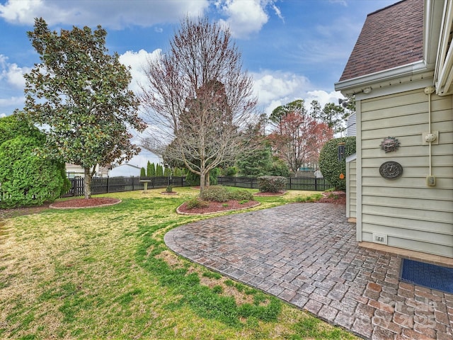 view of yard featuring a fenced backyard and a patio