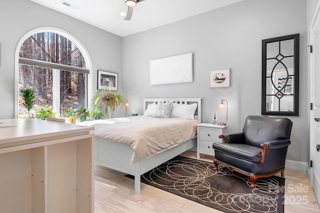 bedroom featuring ceiling fan and visible vents