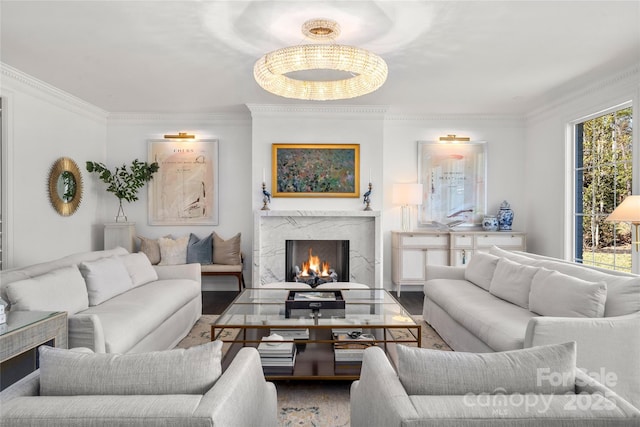 living area with a fireplace, wood finished floors, and crown molding