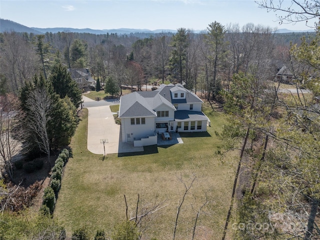 bird's eye view featuring a forest view