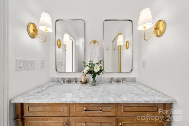 bathroom featuring double vanity and a sink