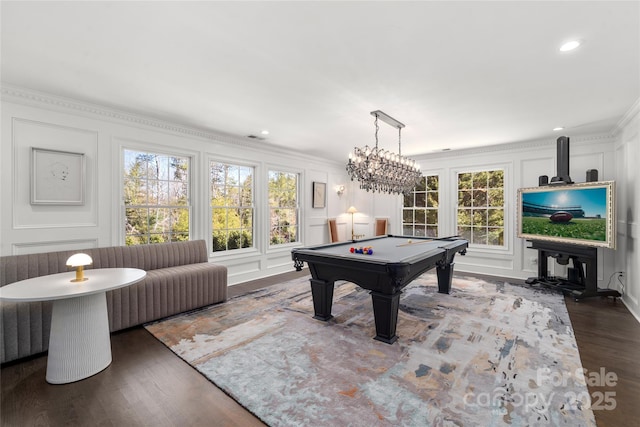 game room featuring crown molding, recessed lighting, pool table, a decorative wall, and wood finished floors