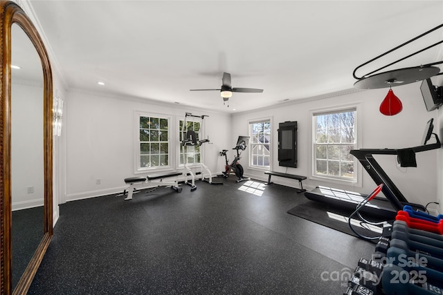 exercise area with ornamental molding, recessed lighting, baseboards, and a ceiling fan