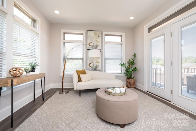 sitting room featuring recessed lighting, wood finished floors, and baseboards