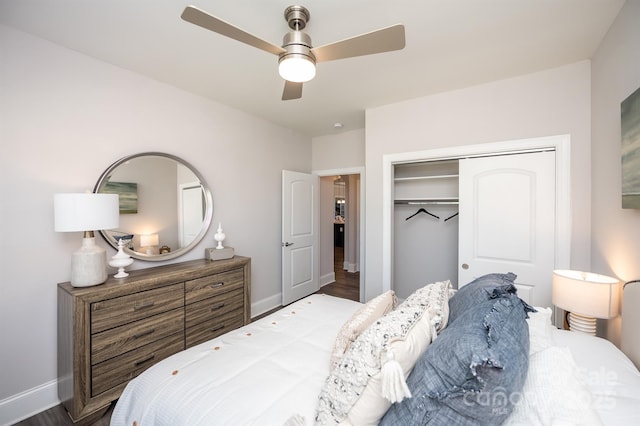 bedroom with a closet, ceiling fan, baseboards, and wood finished floors