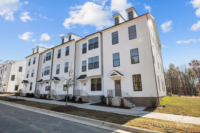 view of front of home with a residential view