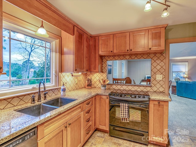 kitchen with decorative backsplash, a sink, light stone countertops, black range with electric cooktop, and dishwasher