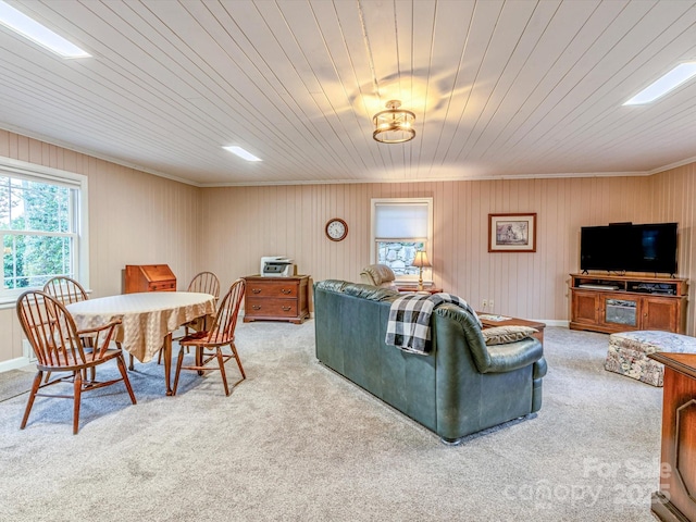 living area featuring carpet