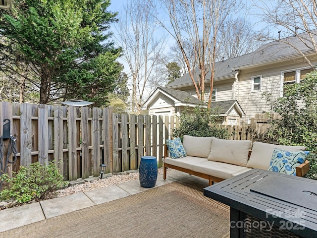 view of patio / terrace with outdoor lounge area and fence