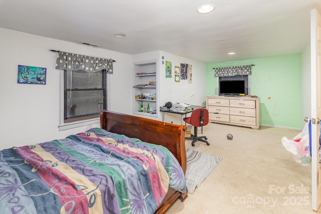 bedroom with carpet floors, recessed lighting, visible vents, and baseboards