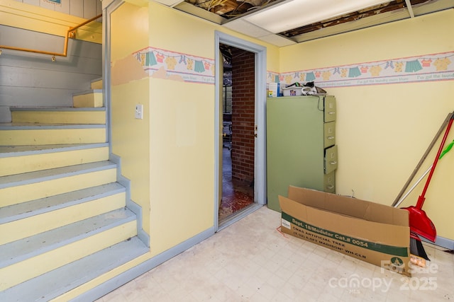 interior space featuring stairway and tile patterned floors