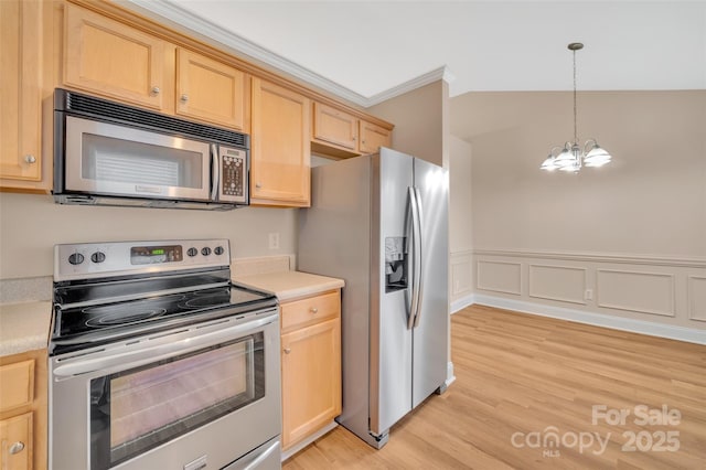 kitchen featuring stainless steel appliances, light brown cabinetry, light wood-type flooring, and light countertops