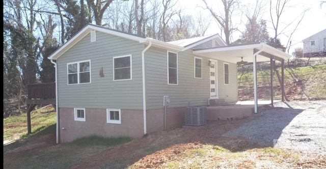 view of property exterior featuring central AC