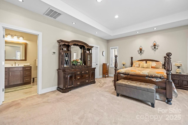 bedroom featuring baseboards, recessed lighting, visible vents, and light colored carpet