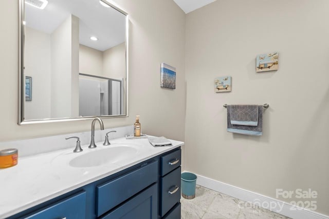 full bathroom with visible vents, vanity, baseboards, marble finish floor, and a stall shower