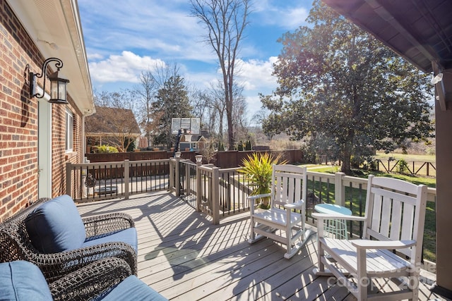 wooden deck featuring fence