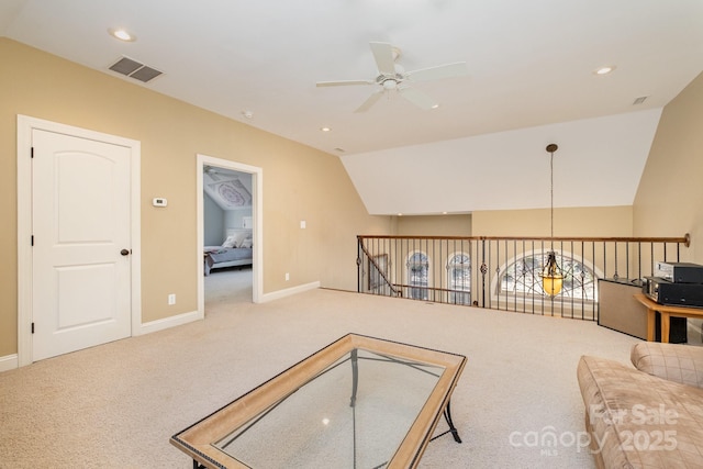 carpeted living area with visible vents, baseboards, ceiling fan, lofted ceiling, and recessed lighting