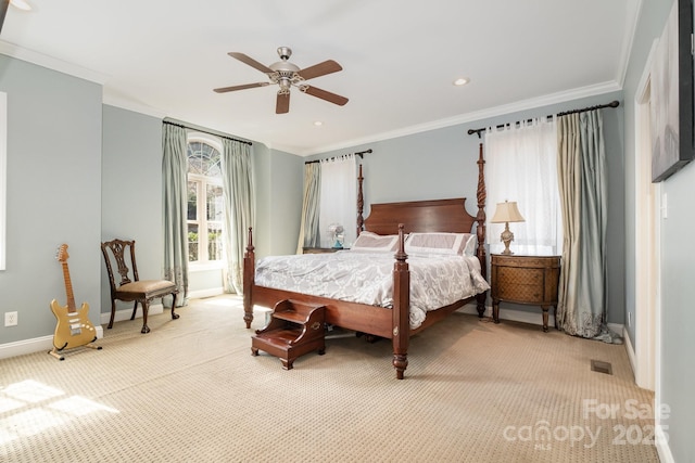 bedroom featuring ornamental molding, a ceiling fan, recessed lighting, baseboards, and light colored carpet