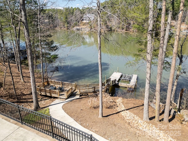 dock area featuring a water view