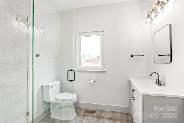 full bathroom featuring a shower stall, visible vents, vanity, and toilet