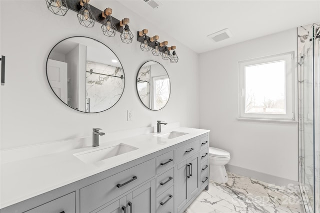 full bath with marble finish floor, a sink, and a wealth of natural light