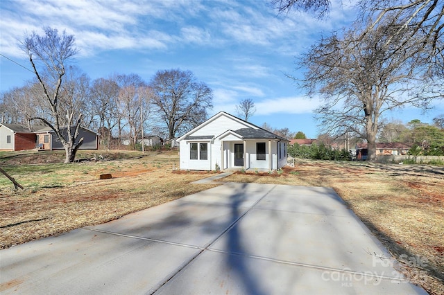 view of front of house with an outbuilding