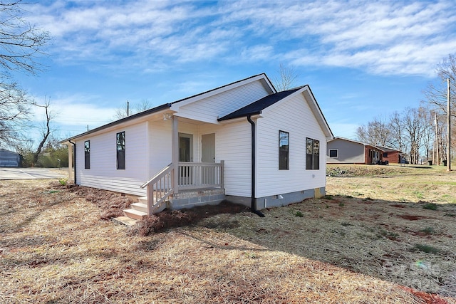 view of front of home with crawl space